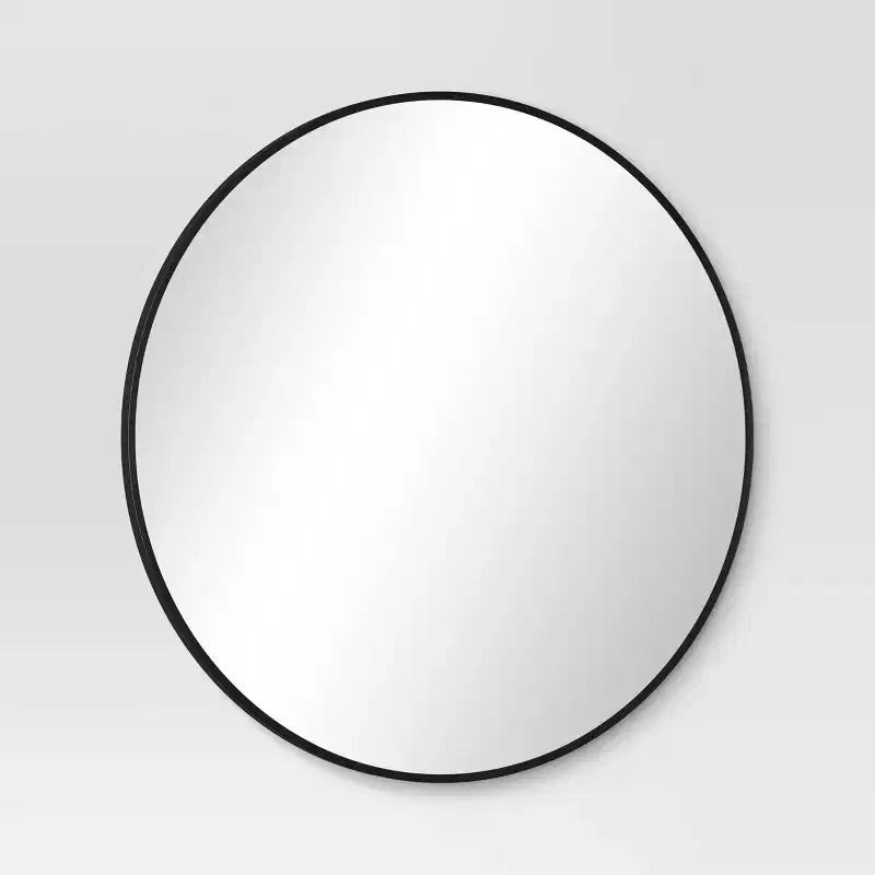 Miroir rond en métal noir