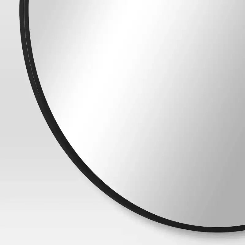 Miroir rond en métal noir